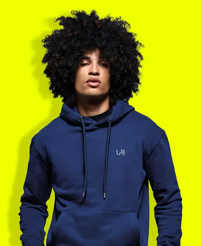 Male model wearing The Ultimate Boon Anthem Hoodie in blue